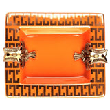 Orange ashtray